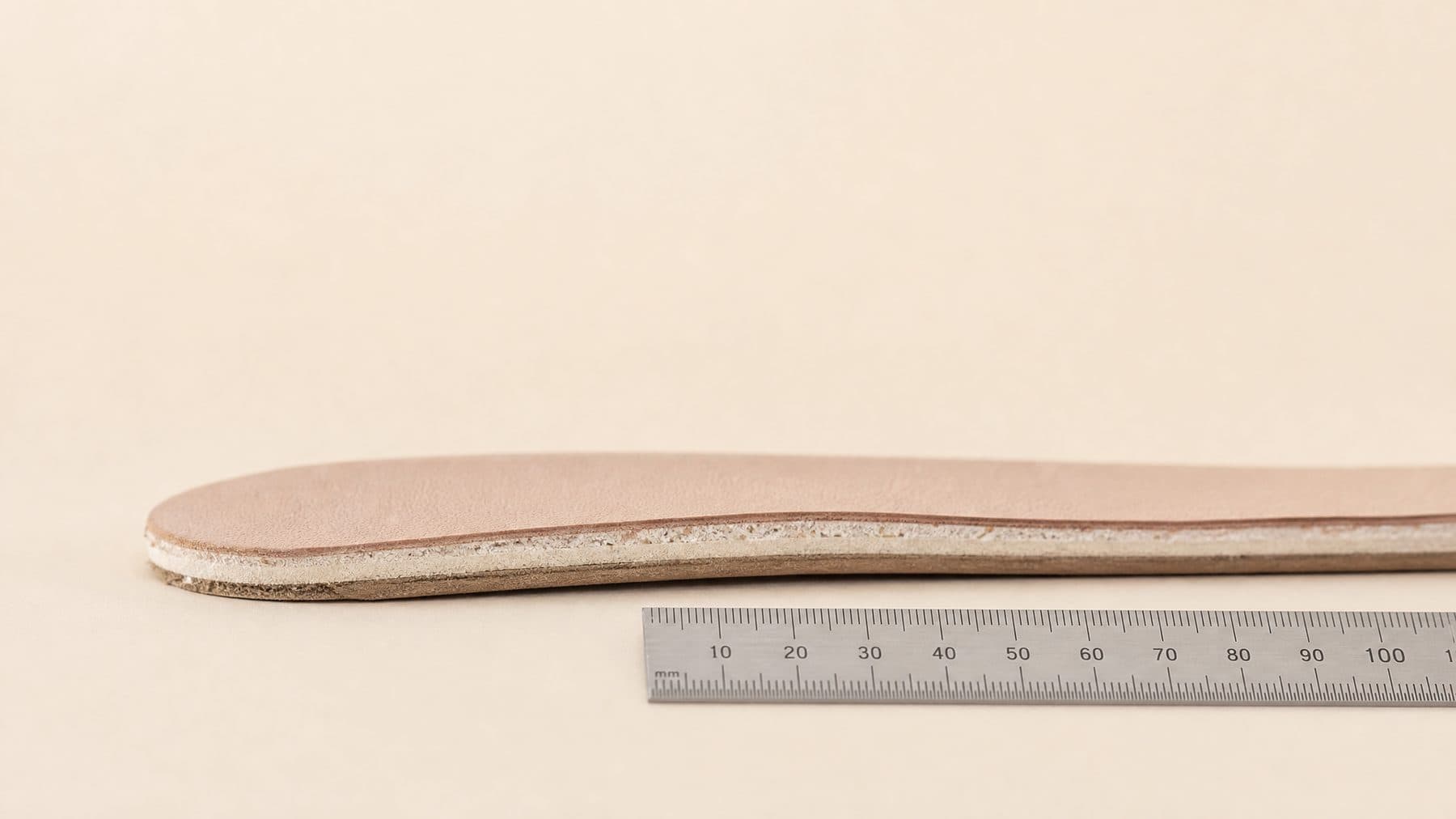 Cross-section of the Ballet Classic footbed showing 5 mm of padding under the forefoot, against a millimetre rule.