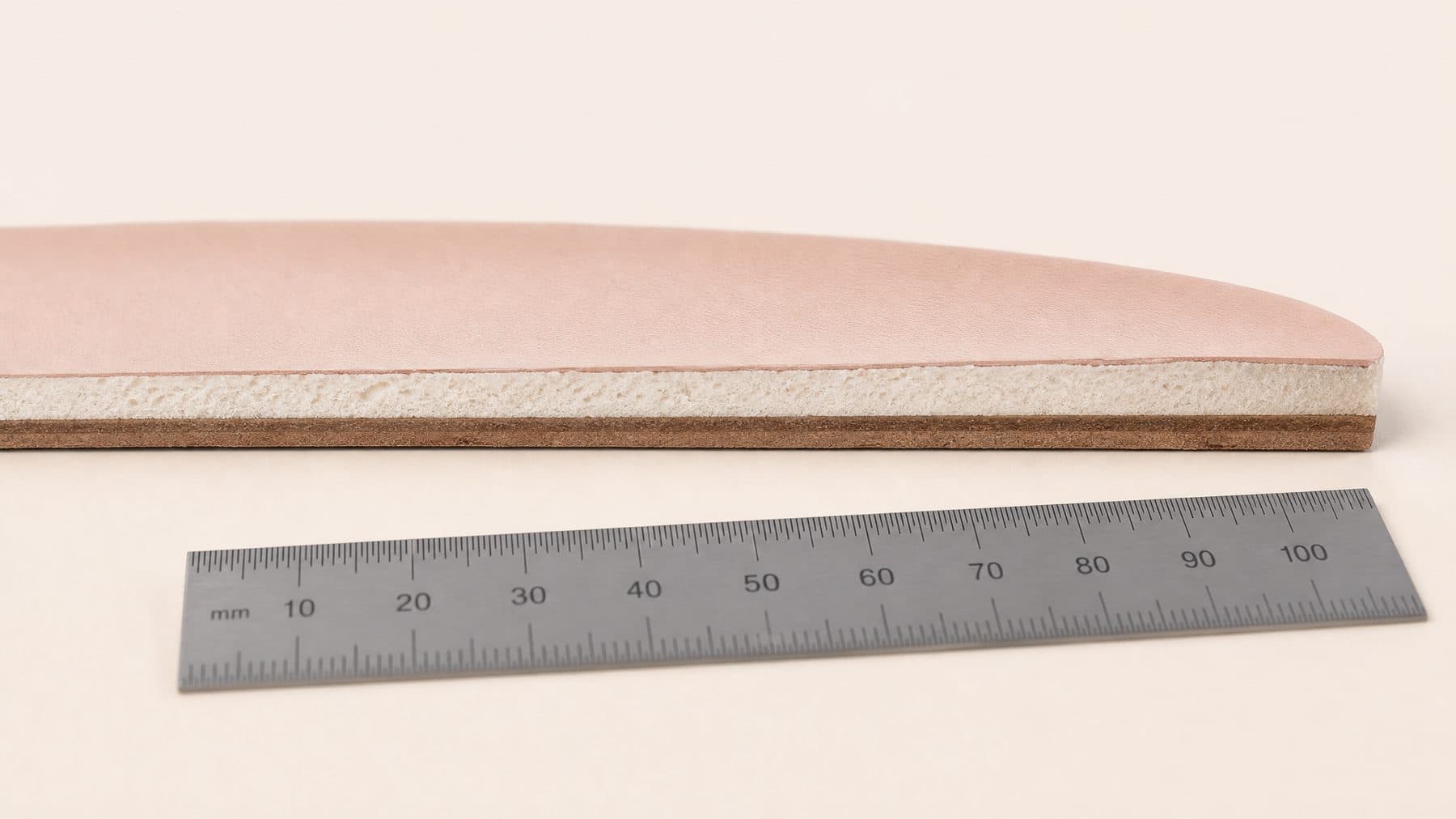 Cross-section of the Mary Jane Flat footbed showing 8 mm of padding under the forefoot, against a millimetre rule.