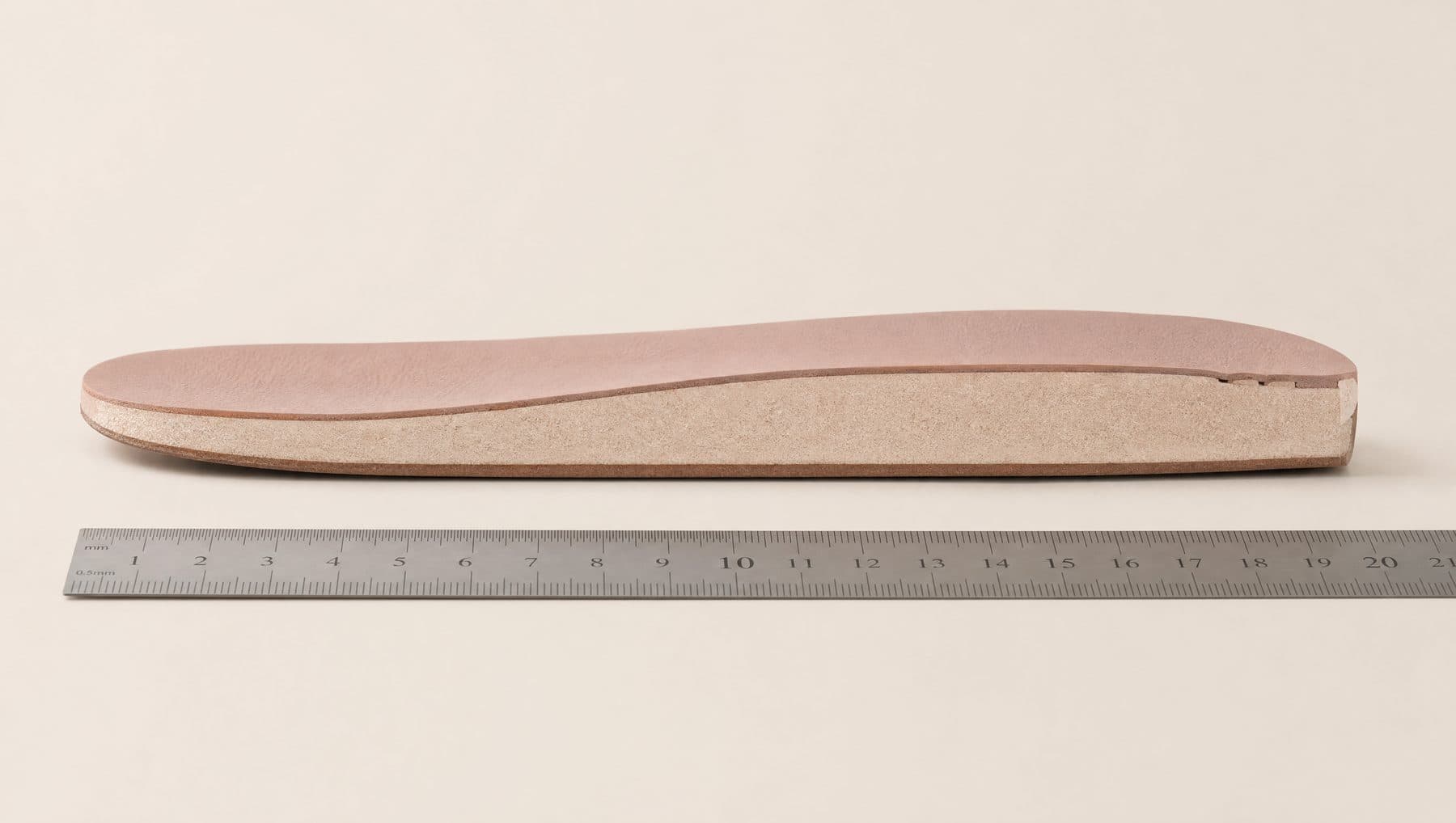 Cross-section of the Ballet Premium footbed showing 10 mm of padding under the forefoot, against a millimetre rule.