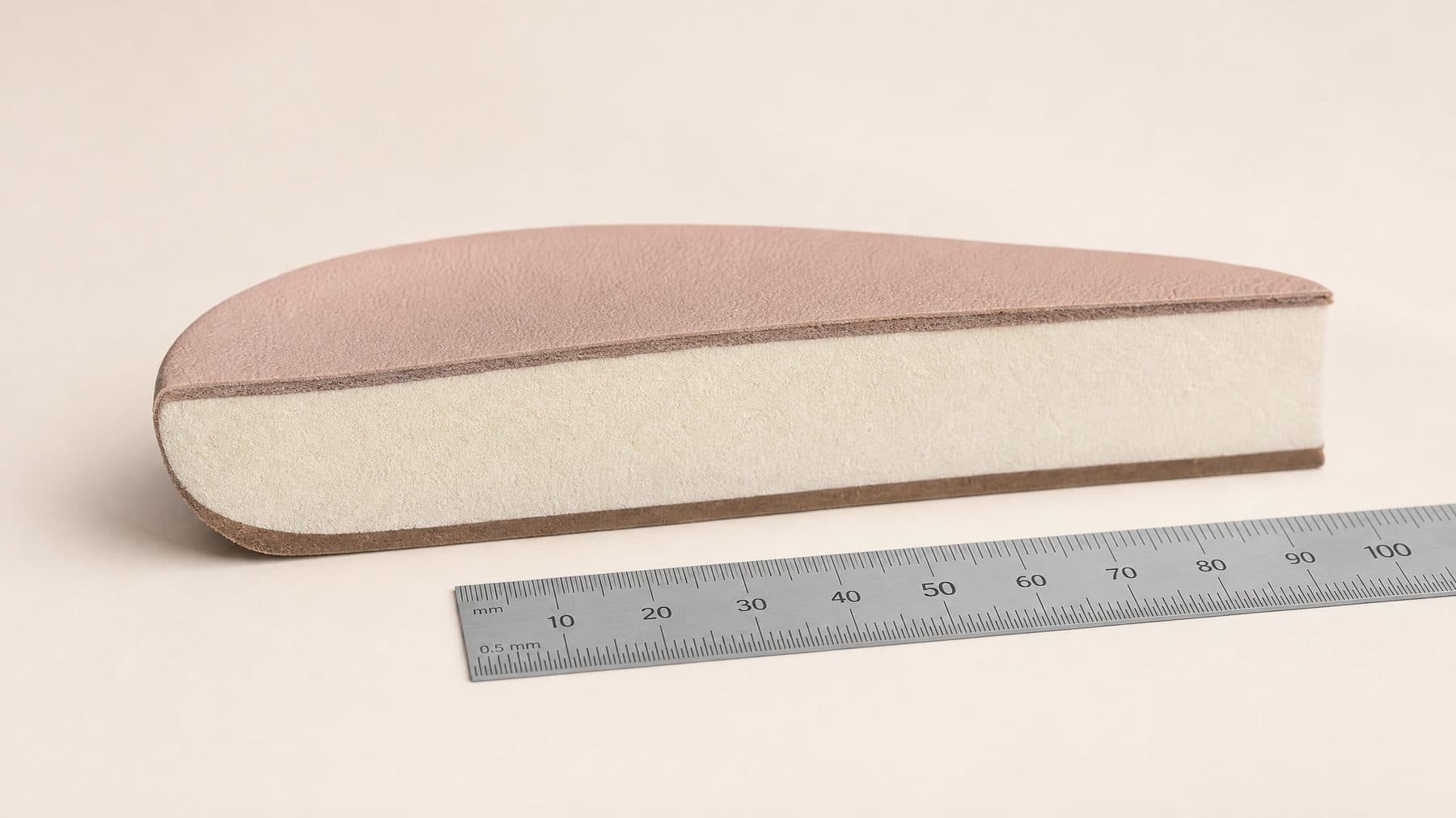 Cross-section of the Block Wide Fit footbed showing 12 mm of padding under the forefoot, against a millimetre rule.