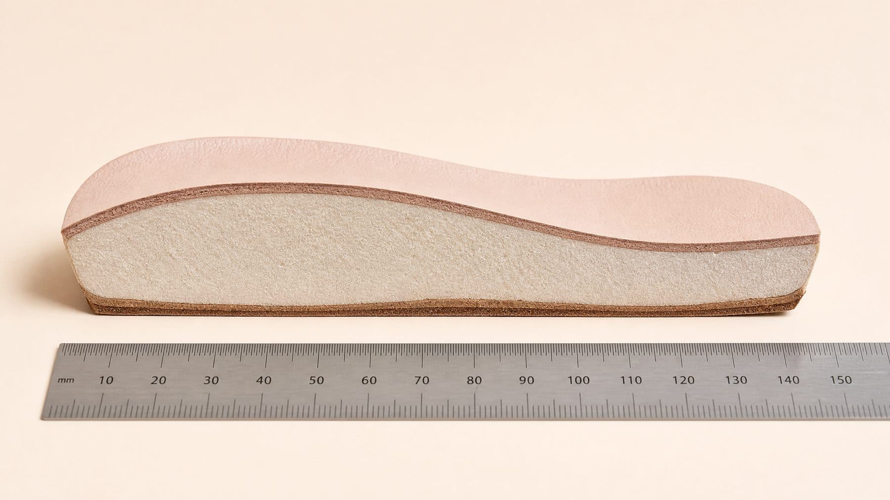 Cross-section of the Derby Premium footbed showing 16 mm of padding under the forefoot, against a millimetre rule.